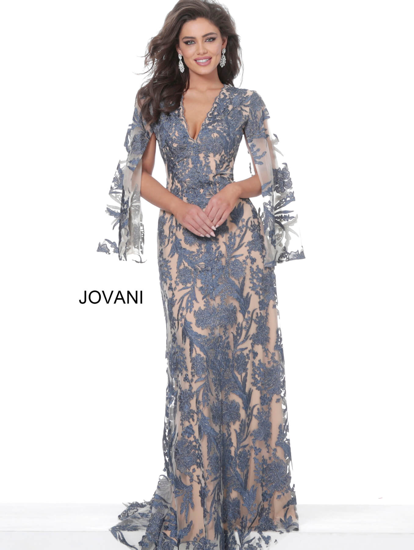 Model in Jovani 00752 navy lace gown, highlighting fitted silhouette and contrast details.