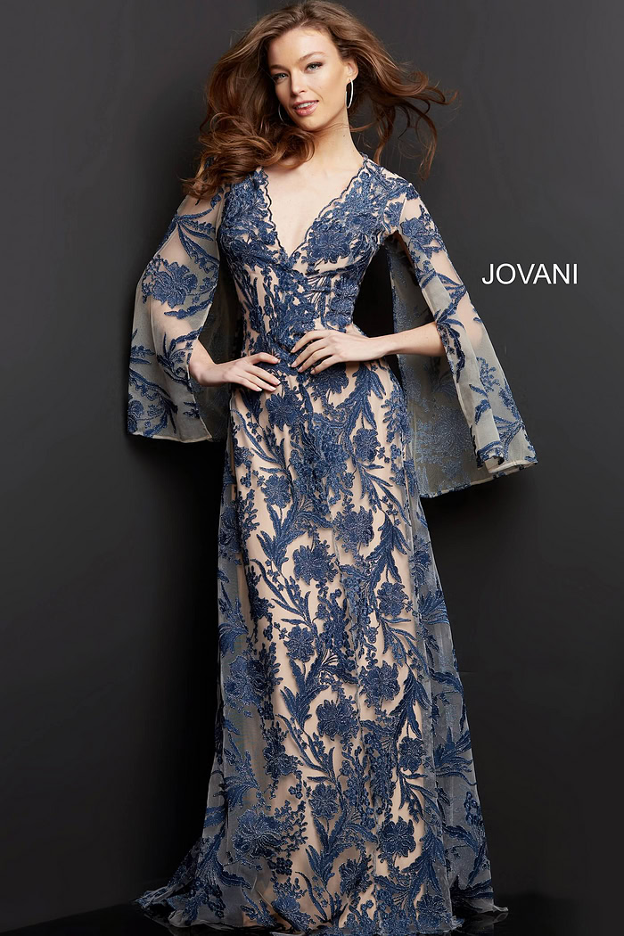 model wearing Jovani 00752 navy A-line gown with floral embroidery and bell sleeves