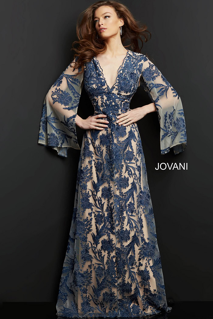 model wearing Jovani 00752 navy A-line gown with floral embroidery and bell sleeves