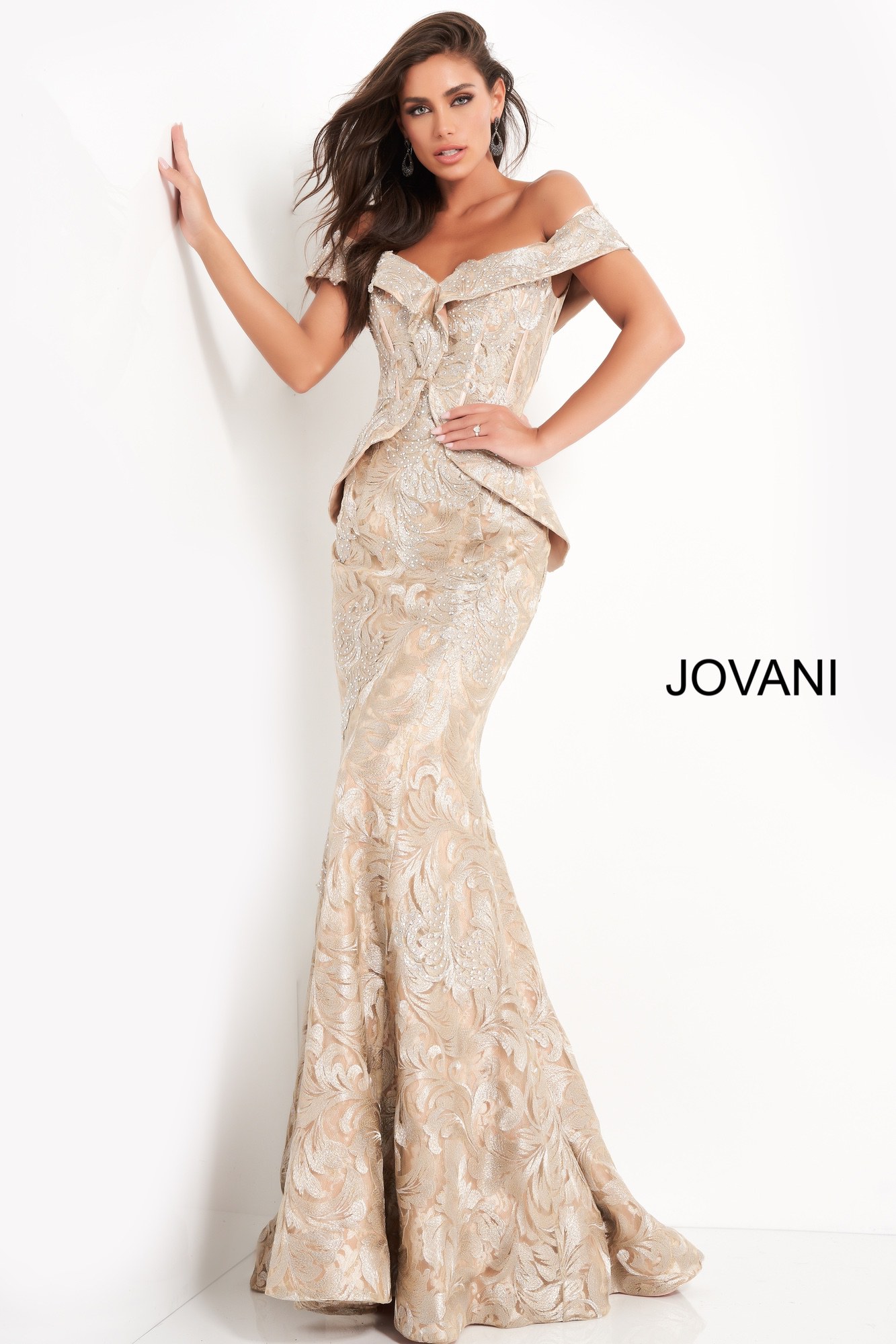 Model wearing Jovani 02762 gold off-the-shoulder mermaid dress front view.