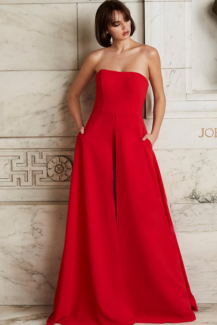 Jovani 03529 model in a strapless red dress, highlighting elegant floor-length design.