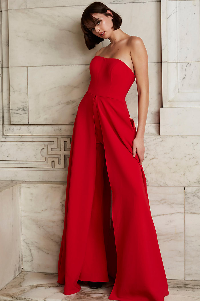Model wearing Jovani 03529 elegant red strapless dress with A-line silhouette.