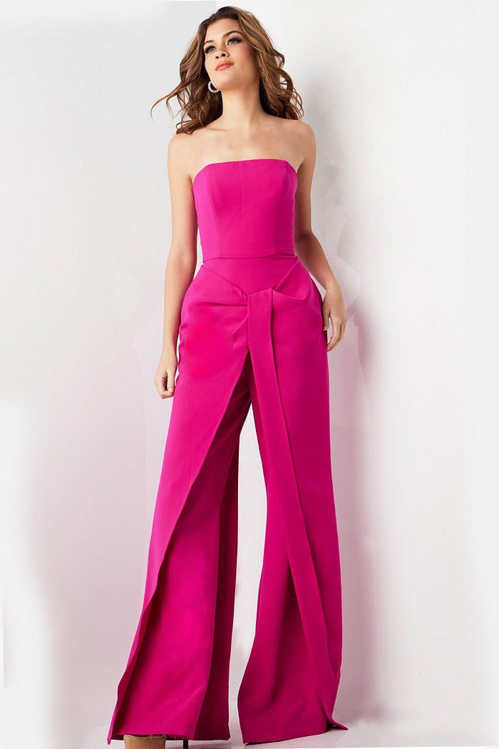 Model wearing Jovani 03828 fuchsia strapless jumpsuit with wide-leg pants, front view.