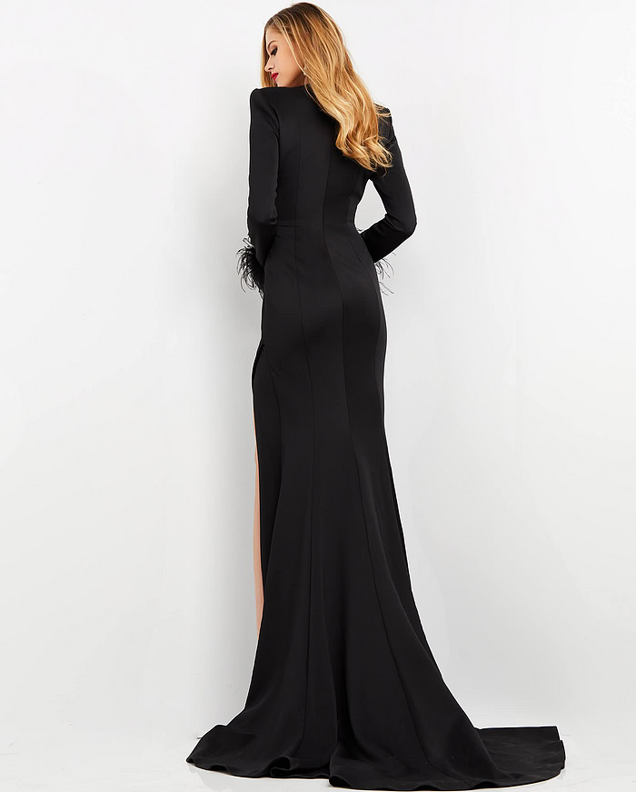back view of model in Jovani 04501 black gown featuring long train