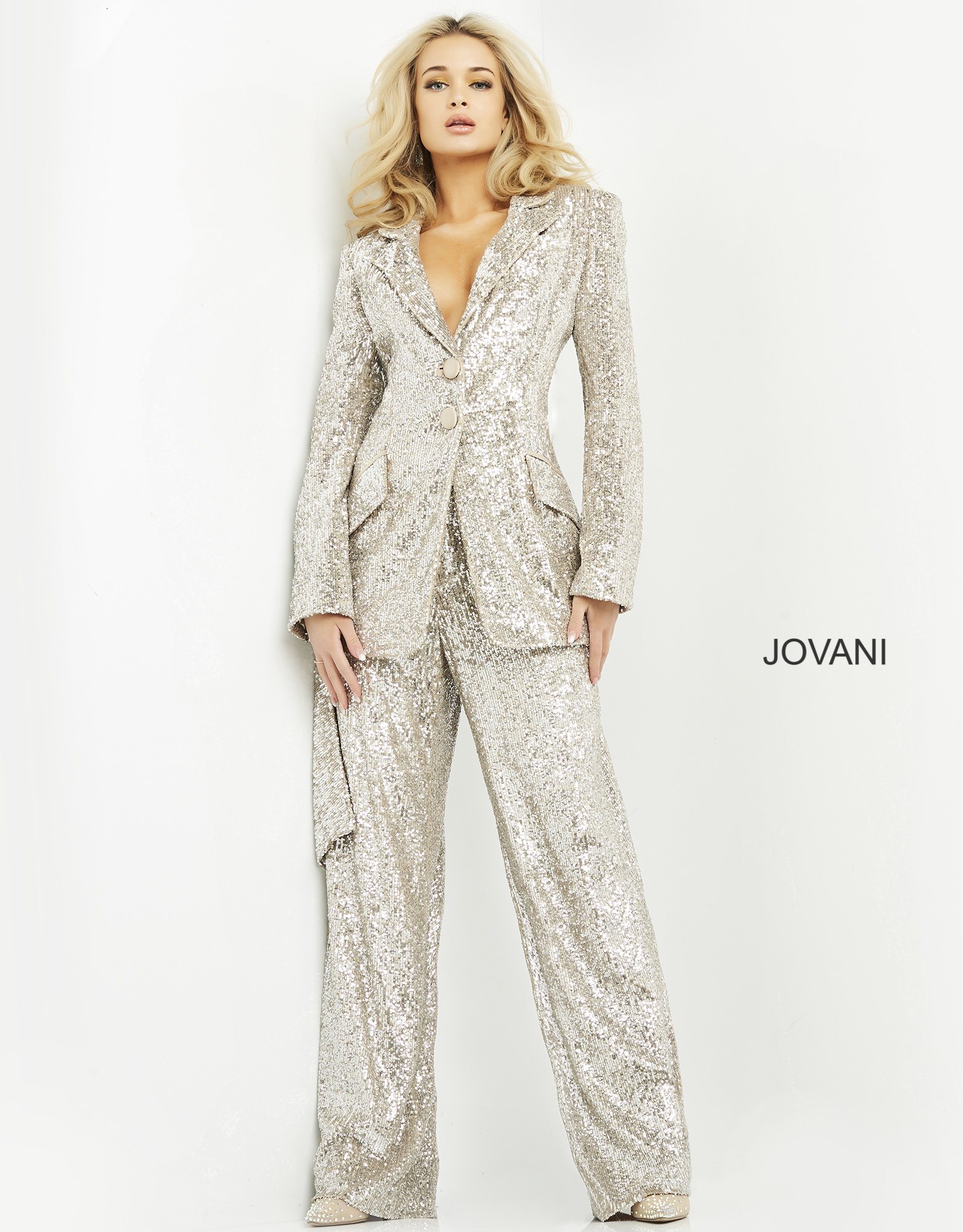 Model in a Jovani 04904 pantsuit, showcasing sequin details.
