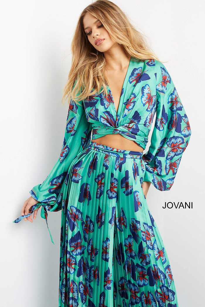 model wearing Jovani 06844 Print top with butterfly print and long sleeves
