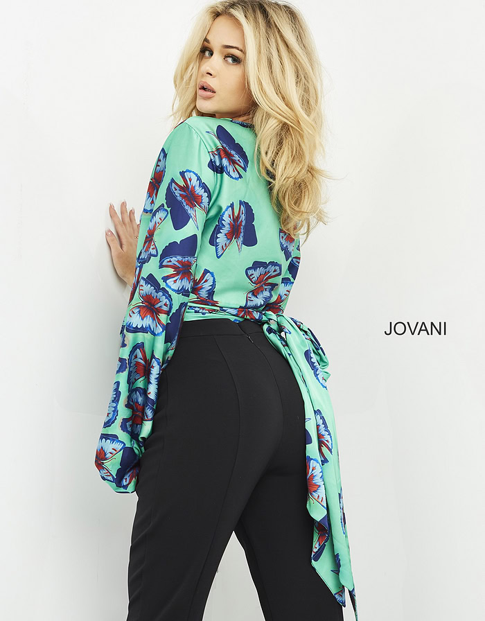 model wearing Jovani 06844 Print top with butterfly print and long sleeves