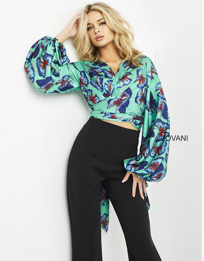 model wearing Jovani 06844 Print top with butterfly print and long sleeves