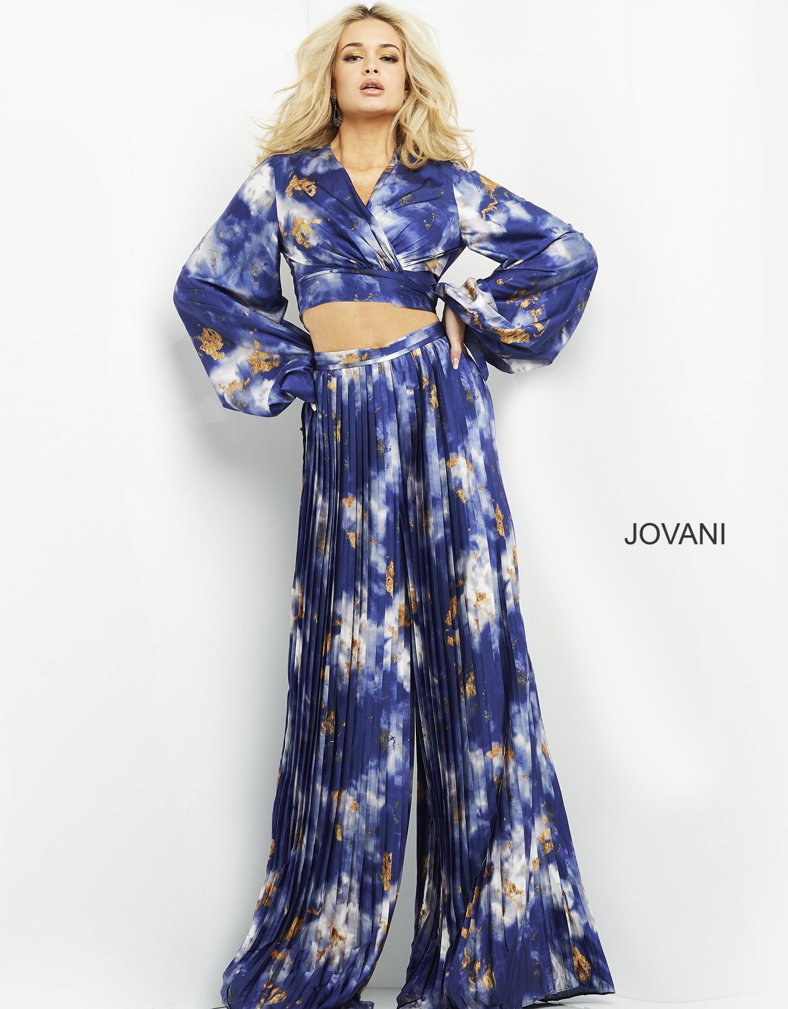 Model wearing Jovani 06849 dress, full-length front view with puff sleeves.