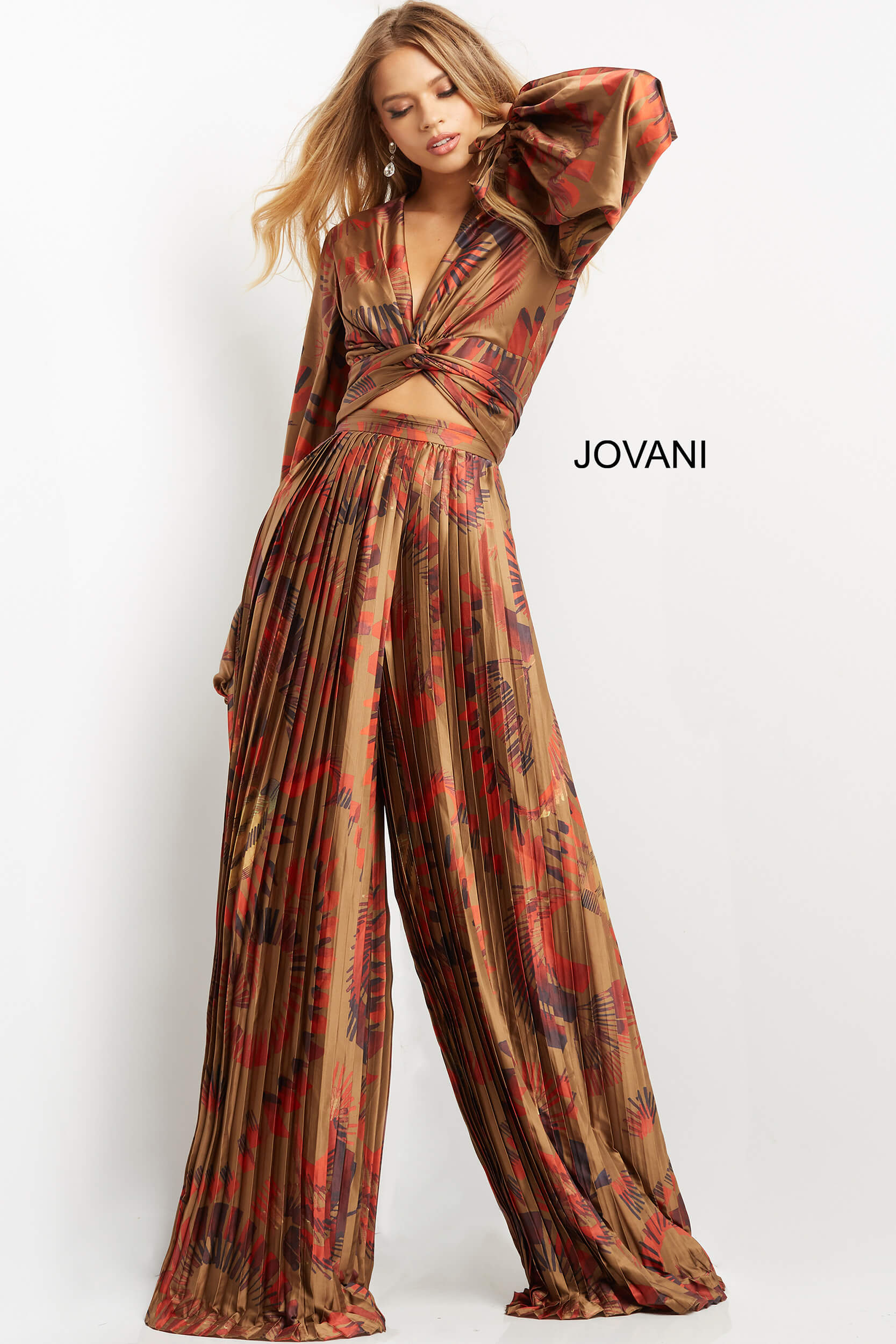 Model wearing Jovani 06851 in a multi-color dress with voluminous sleeves.