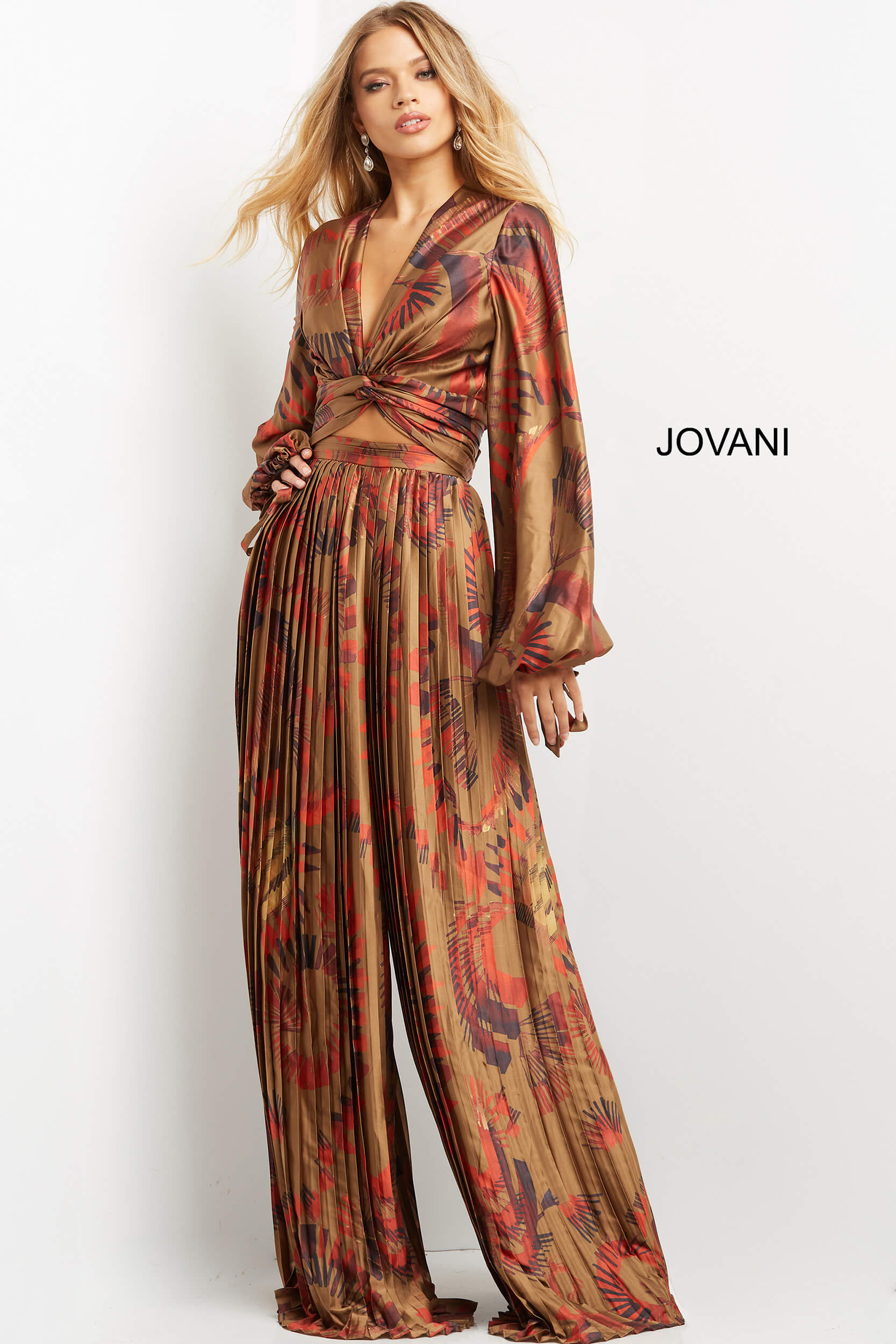 Model showcasing Jovani 06851, highlighting the twisted waist design.