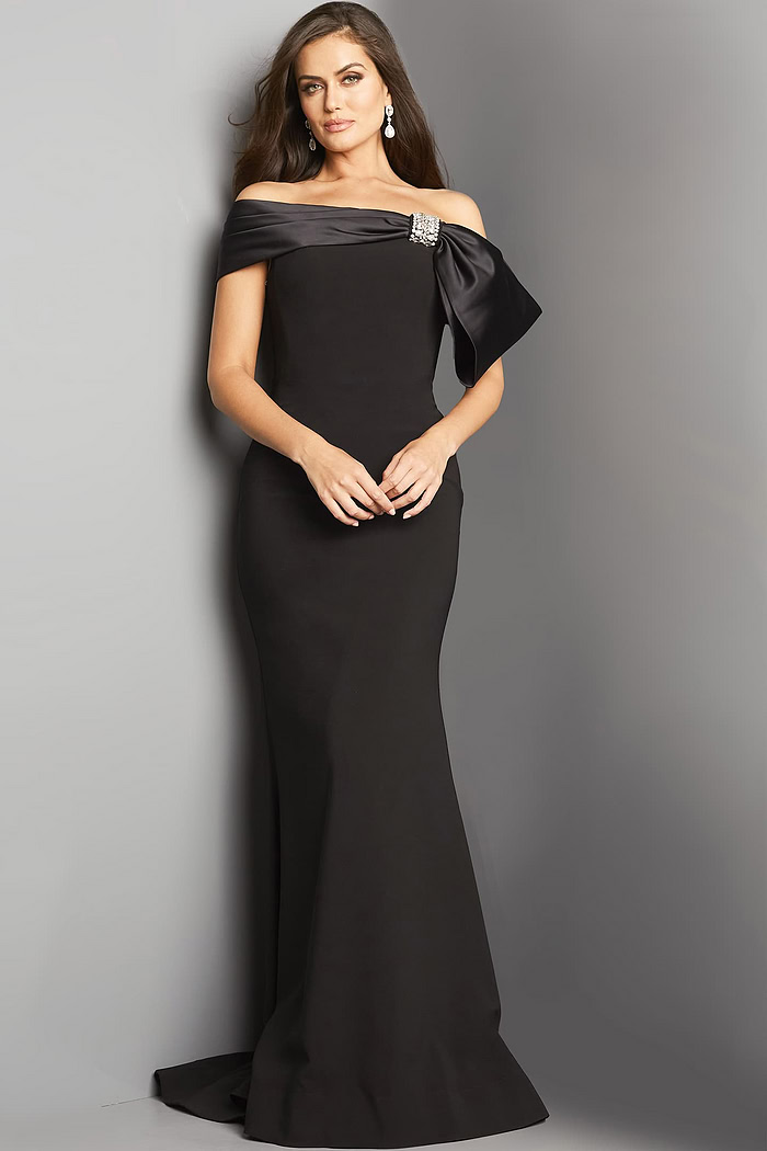 Model posing in Jovani 07014 black floor-length dress.
