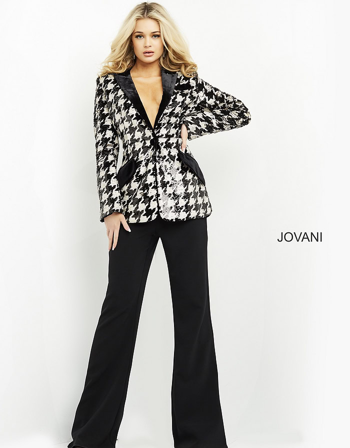 model wearing Jovani 07239 black ensemble with houndstooth jacket; another front view