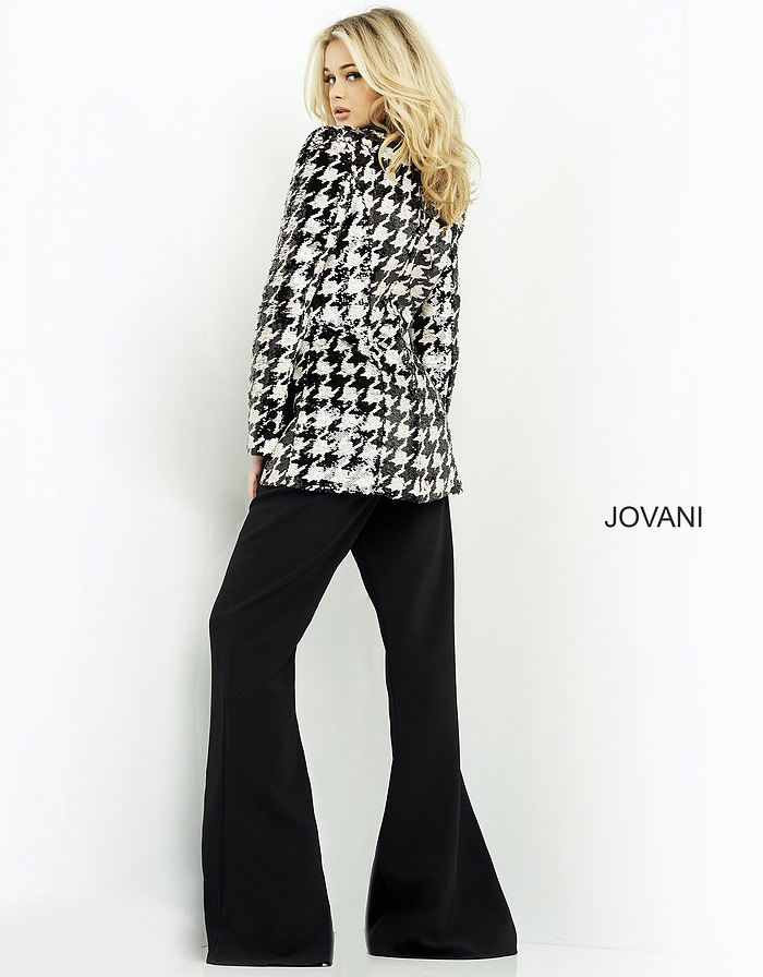 model wearing Jovani 07239 black ensemble, back view of houndstooth jacket