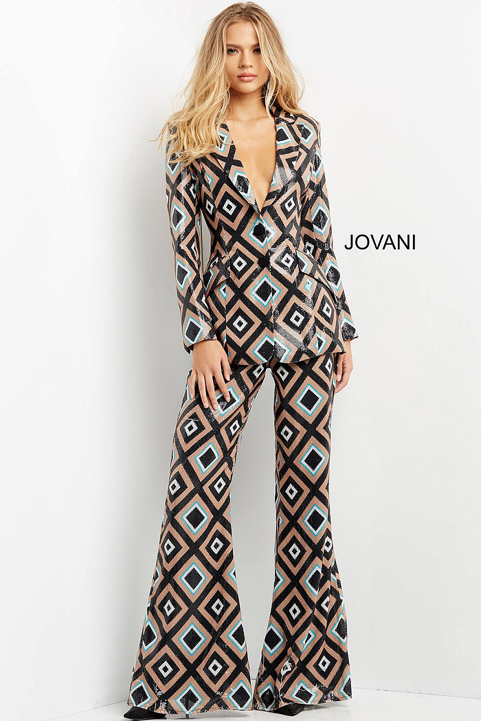 Model showcasing Jovani 07921 jumpsuit with geometric print from the front view.