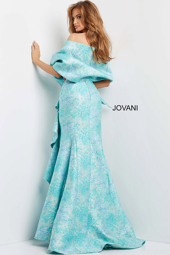 Back view of Jovani 08093 blue multi-color dress showing flowy silhouette and off-shoulder detail.