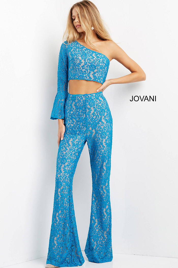 Model wearing Jovani 08693 blue lace set showcasing front details.