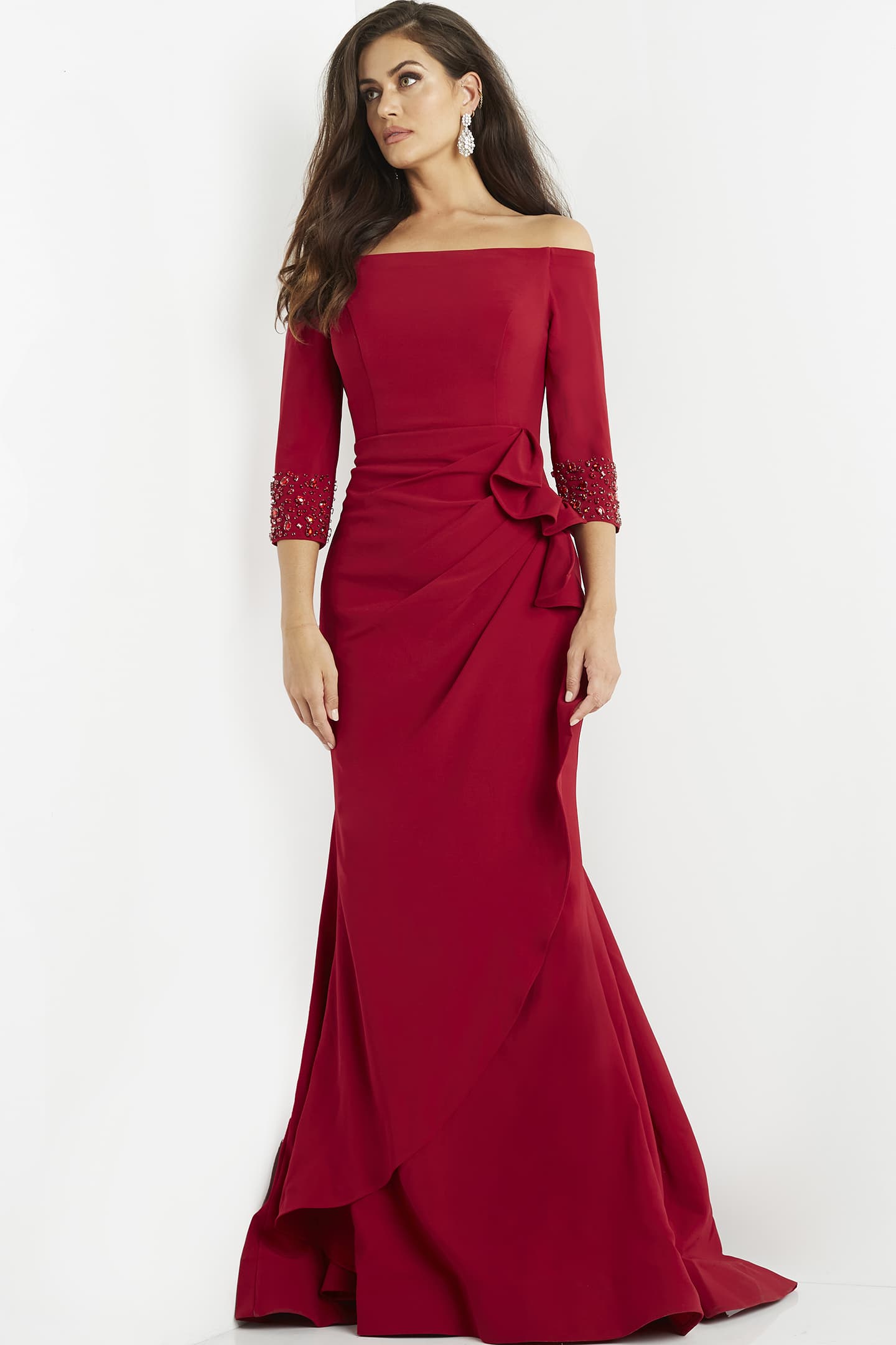 Jovani 08699 red off-the-shoulder gown with ruched waist detail worn by model.