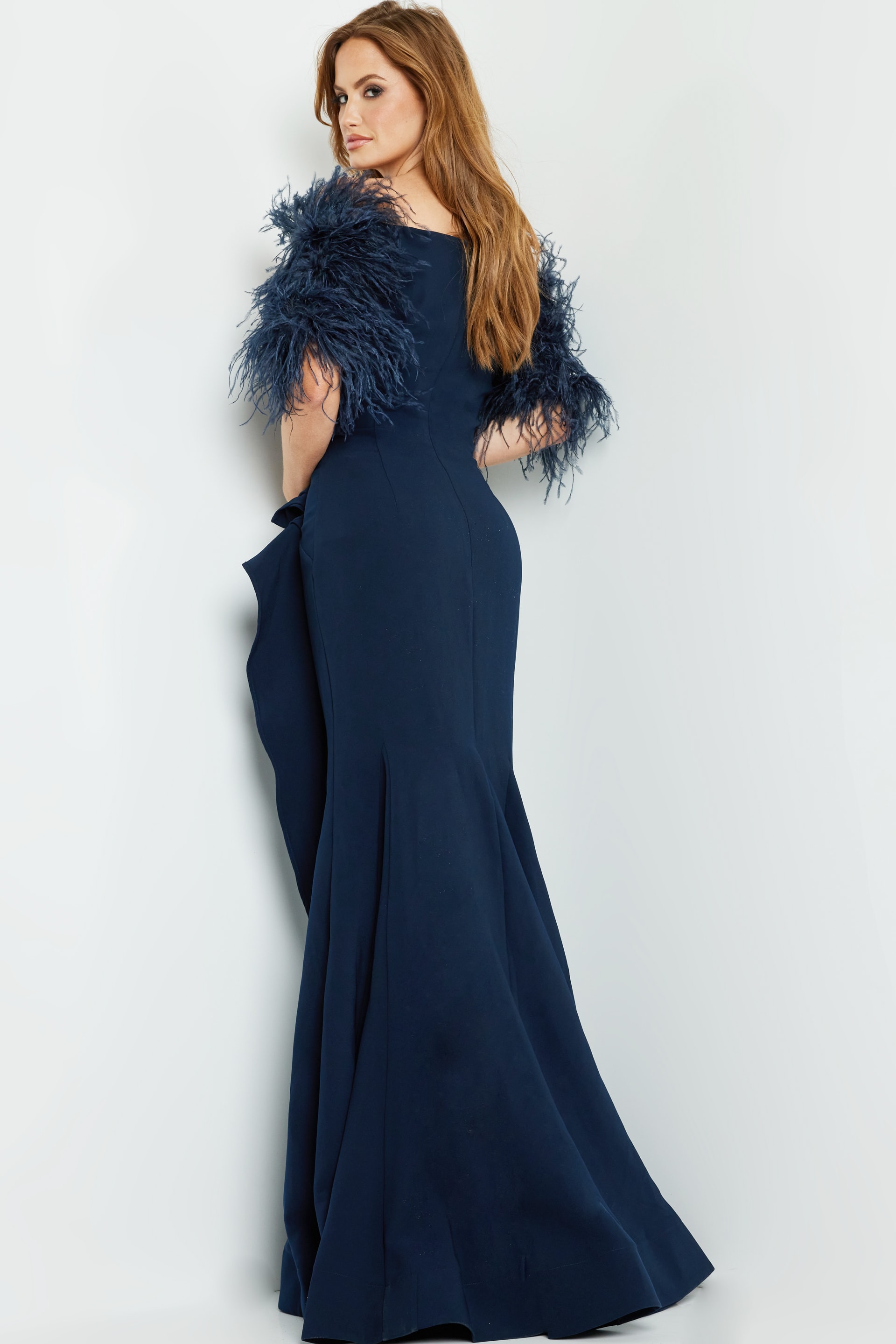 Model wearing Jovani 09154 navy dress, back view, showing silhouette.