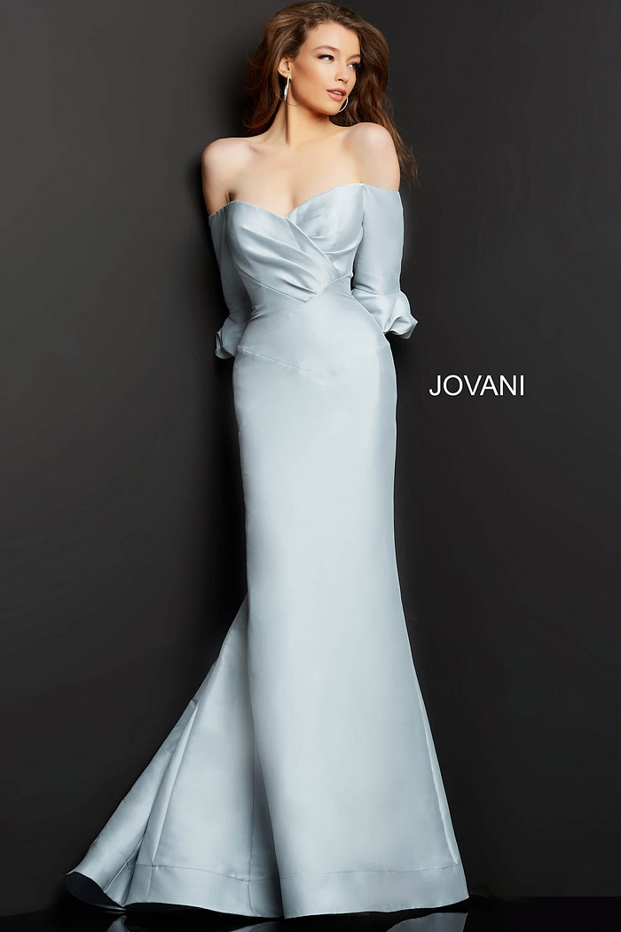 Model wearing Jovani 09420 silver dress, front view showcasing off-shoulder style
