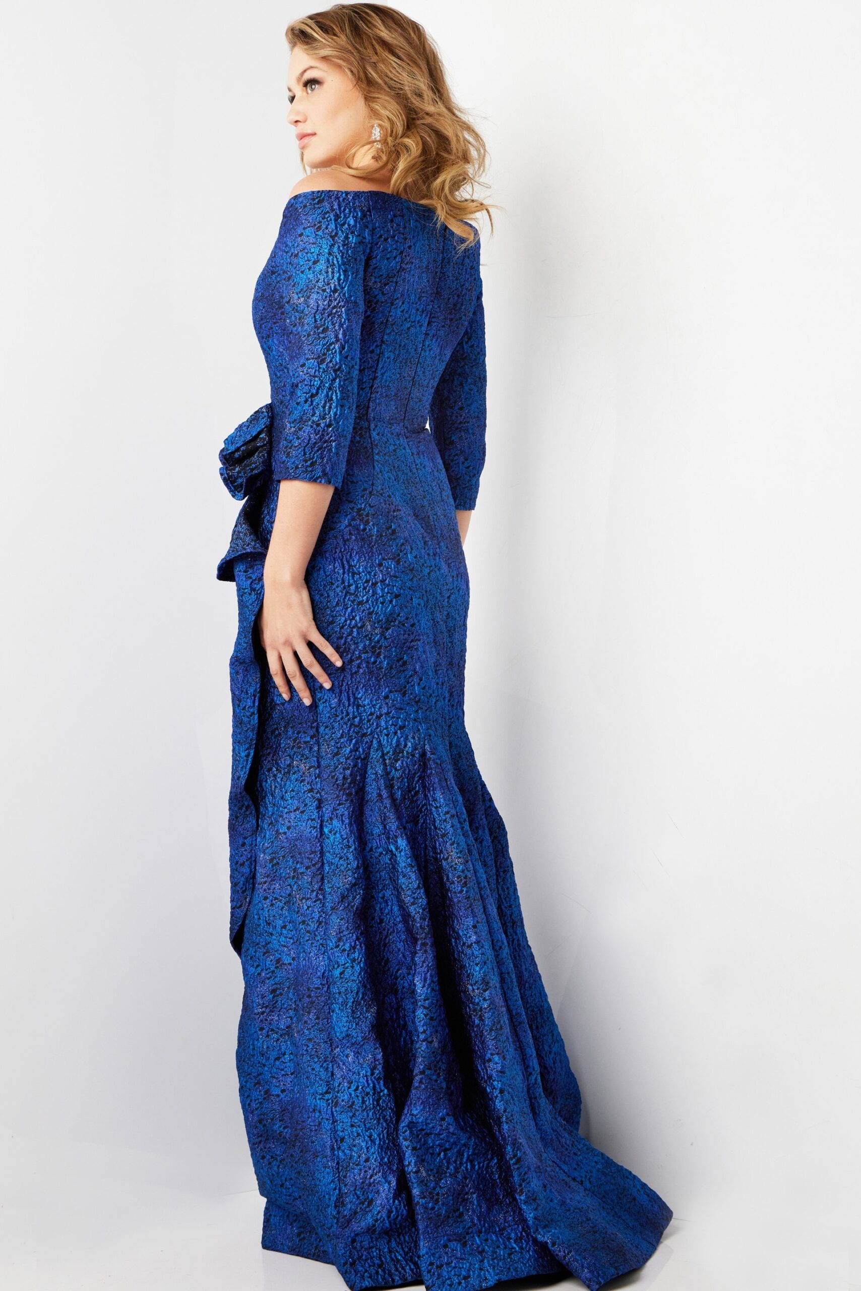 Model showing back of Jovani 09550 blue dress