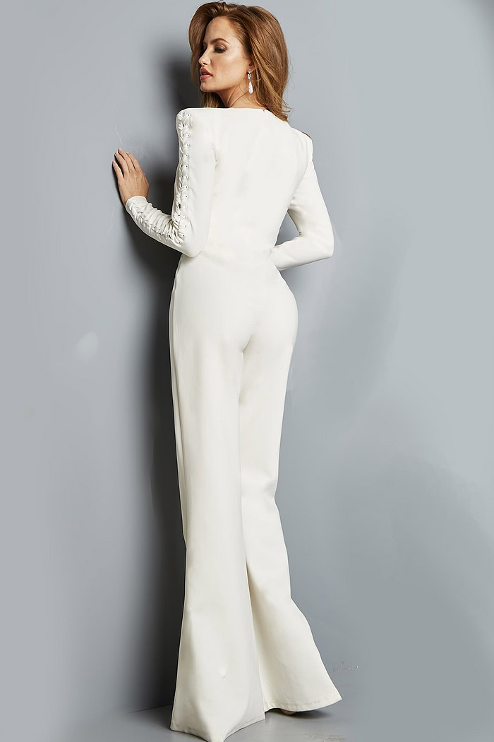model showcasing back view of Jovani 09588 white jumpsuit with lace-up sleeve detail
