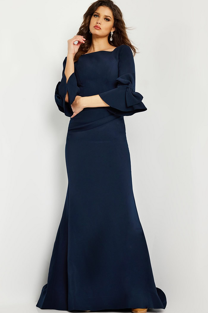 Model wearing Jovani 09776 navy dress, front view.