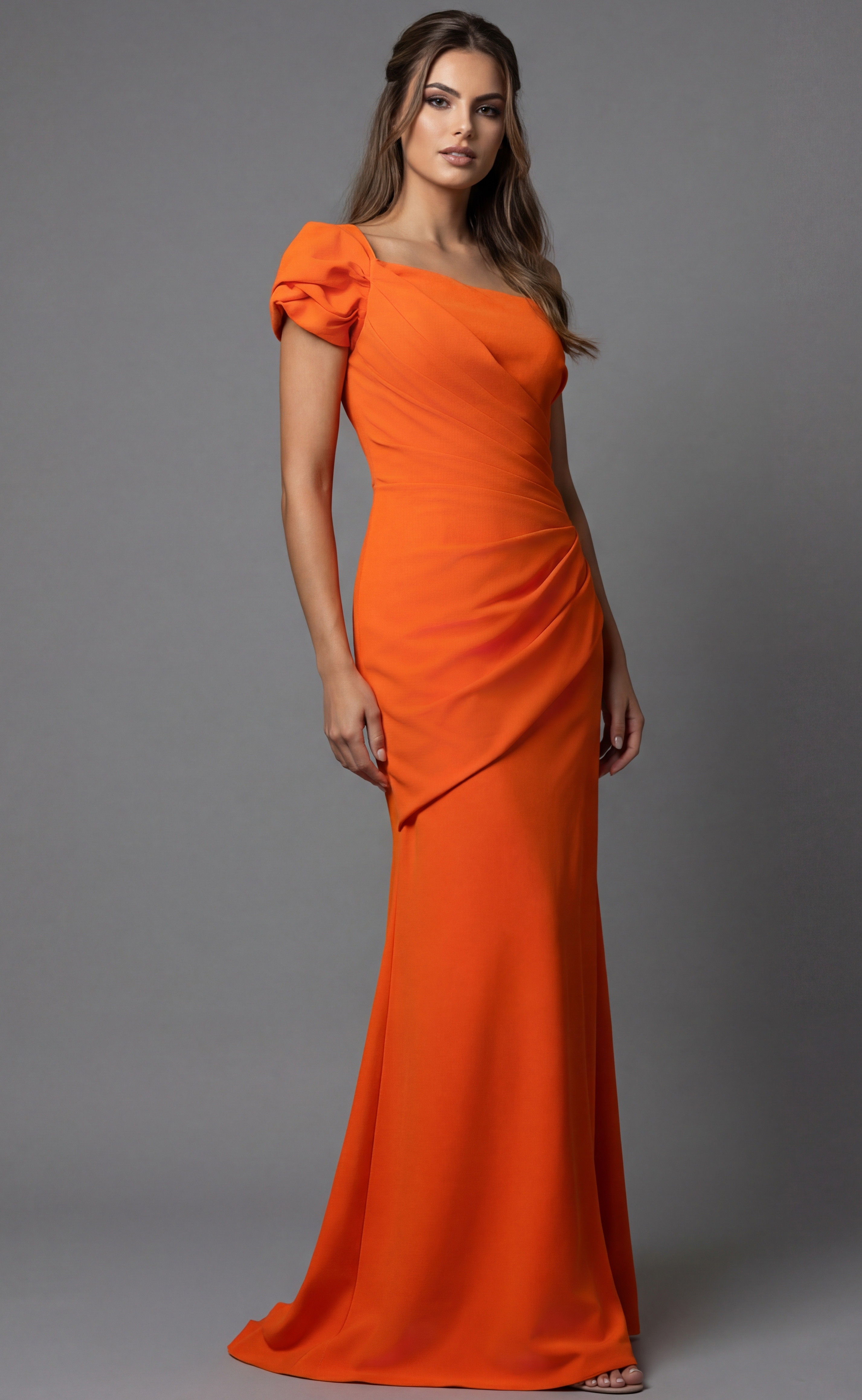 One shoulder fitted gown with draped bodice and floor length silhouette