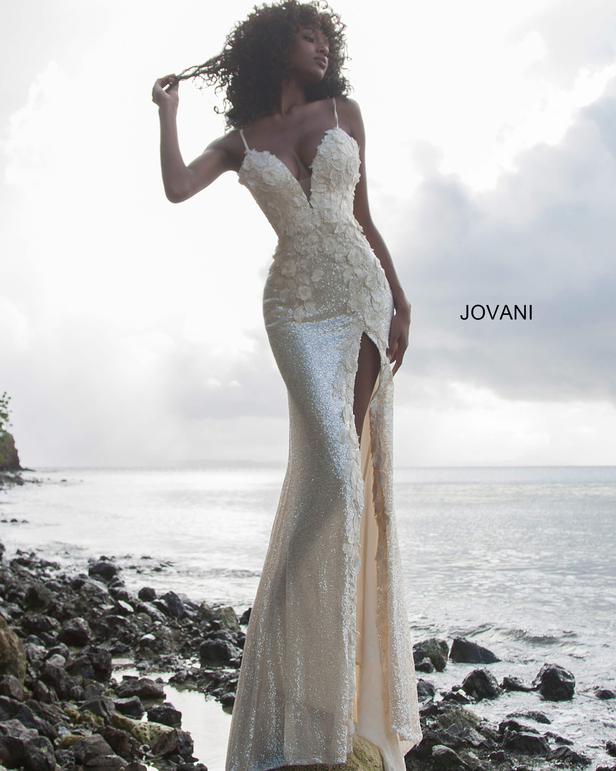 Back view of Jovani 1012 white gown with elegant low back design.