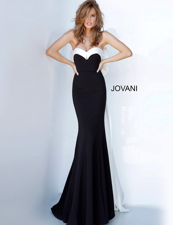 Front view of model in Jovani 12020 black gown with sweetheart neckline