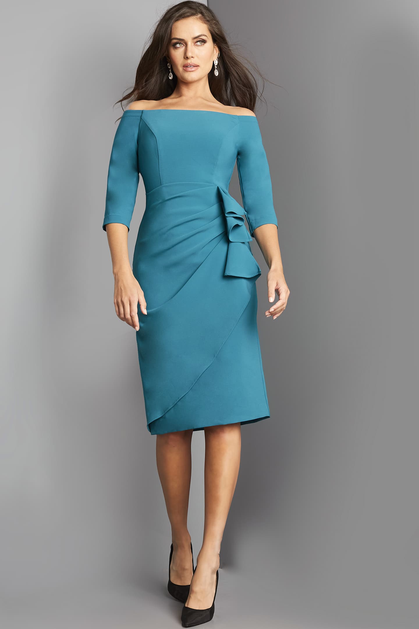 Full view of model wearing Jovani 07442 elegant teal blue dress with chic design features