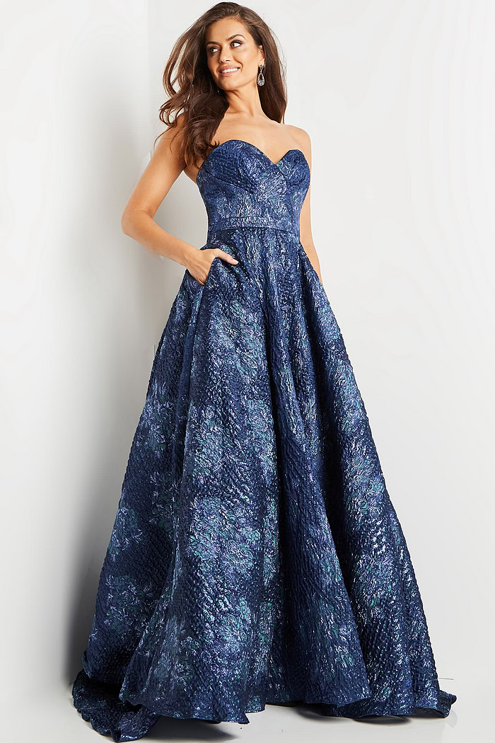 Model wearing Jovani 22792 navy gown with a front view in elegant pose.