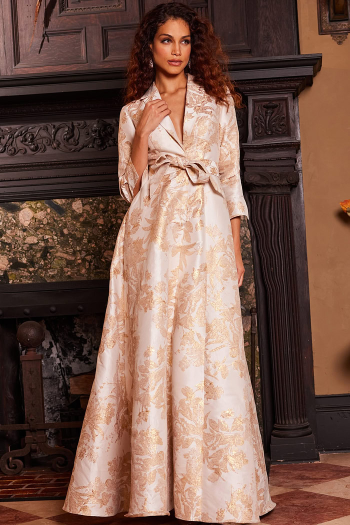 Model wearing Jovani 23178 gold floral brocade dress front view