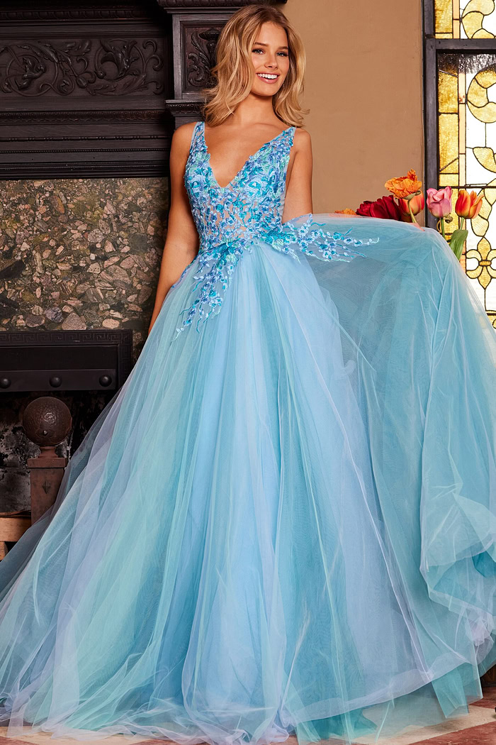 Model wearing Jovani 23577 blue gown highlighting the flowing skirt.