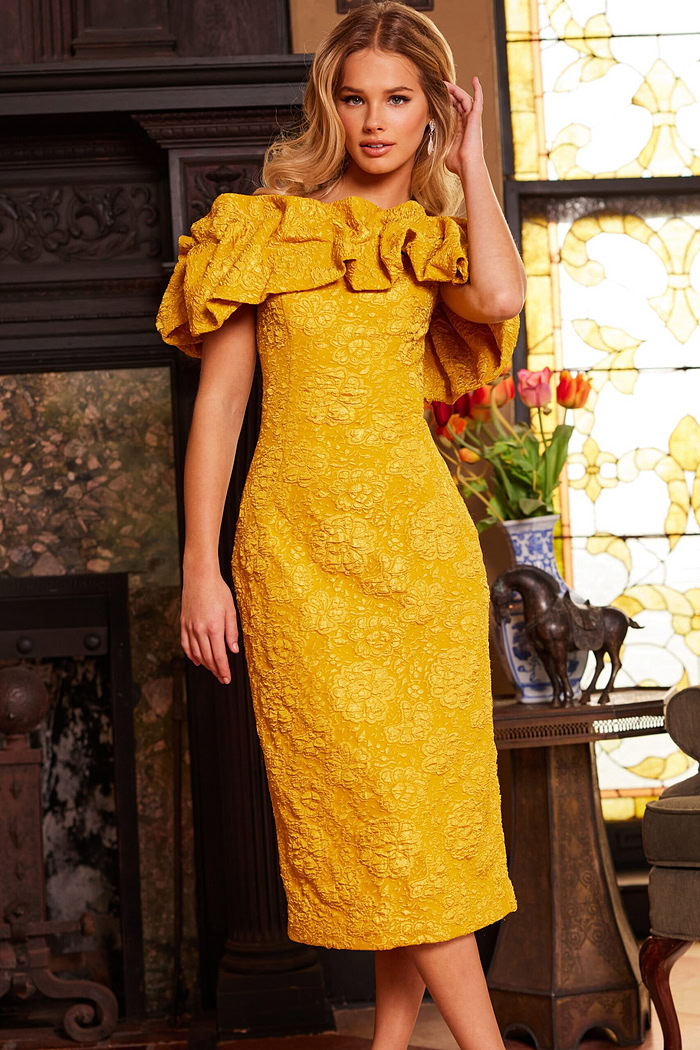 Model in Jovani 23848 yellow dress, detailed look at the off-the-shoulder ruffles.