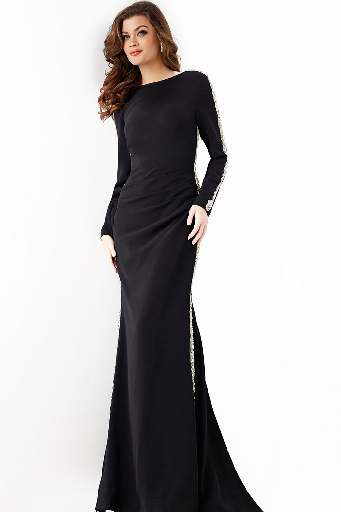 model wearing Jovani 24191: black mermaid gown with silver embellishment, full front view