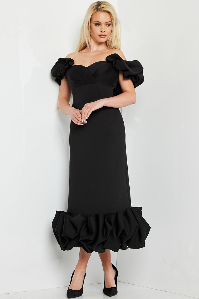 model wearing Jovani 24535 black dress, front view with ruffled details