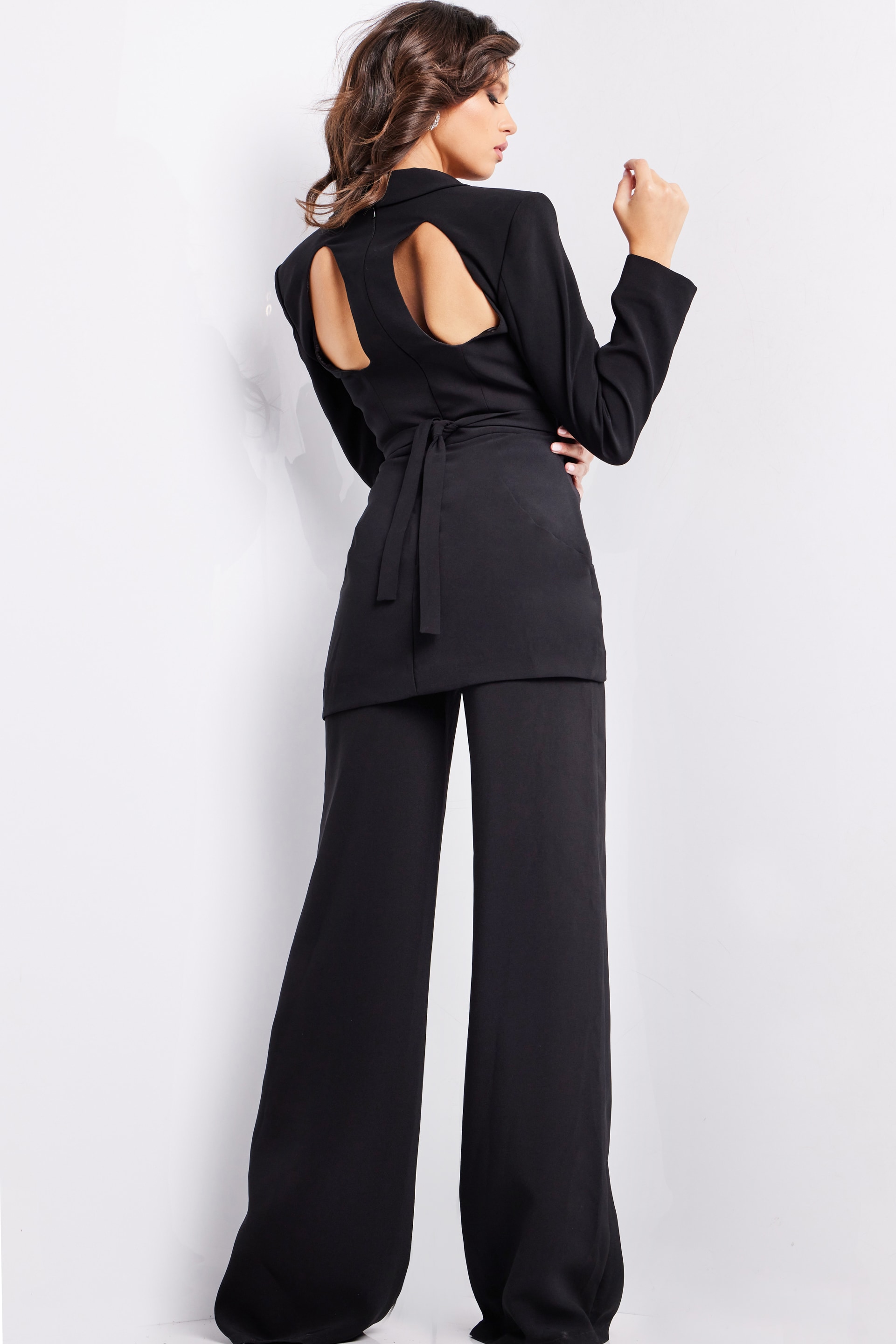 Back view of model in Jovani 25743 ensemble with wide-leg pants and elegant design.