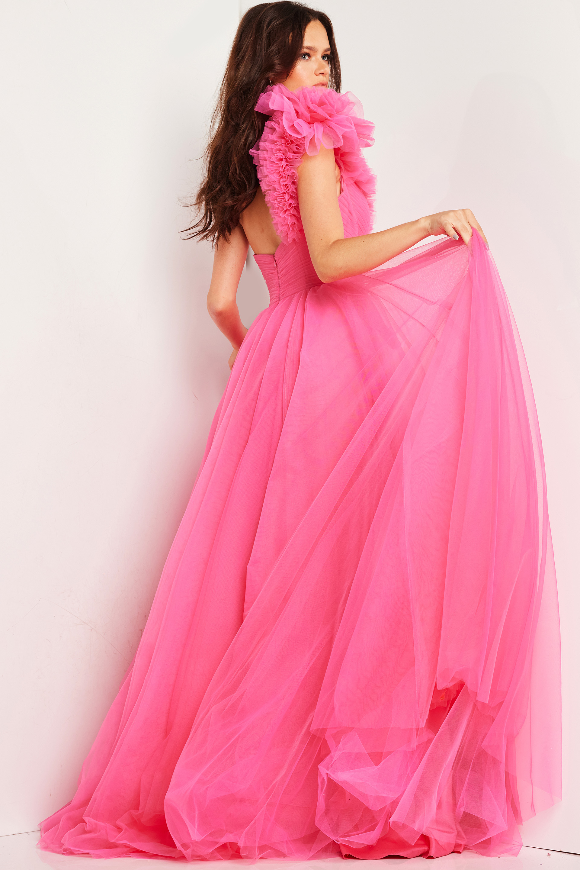 Model wearing Jovani 25919 pink gown, back view