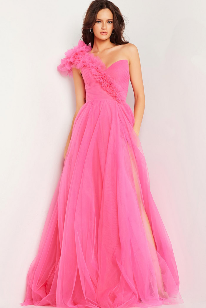 Model wearing Jovani 25919 pink gown, front view with slit