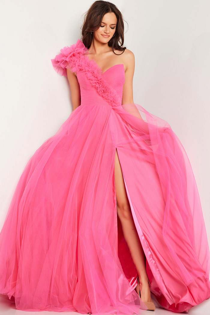 Model wearing Jovani 25919 pink gown, slight front side view