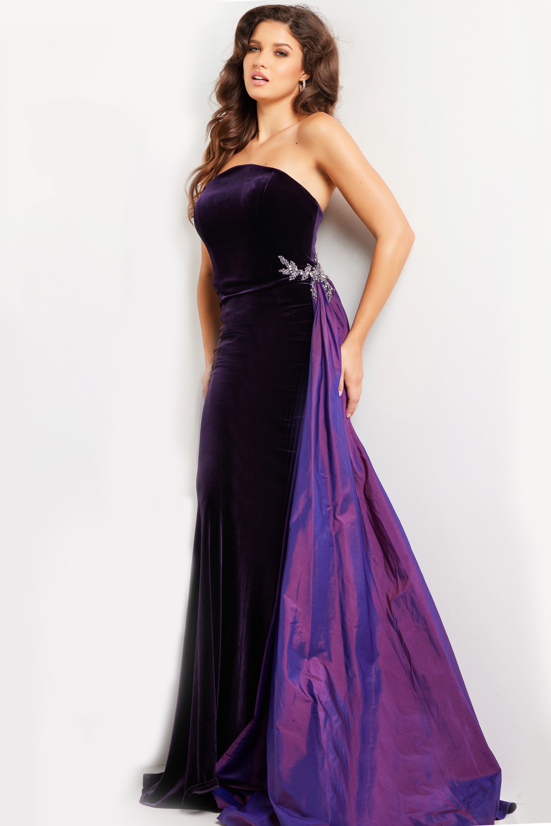 model wearing 26116 purple mermaid silhouette gown with strapless neckline