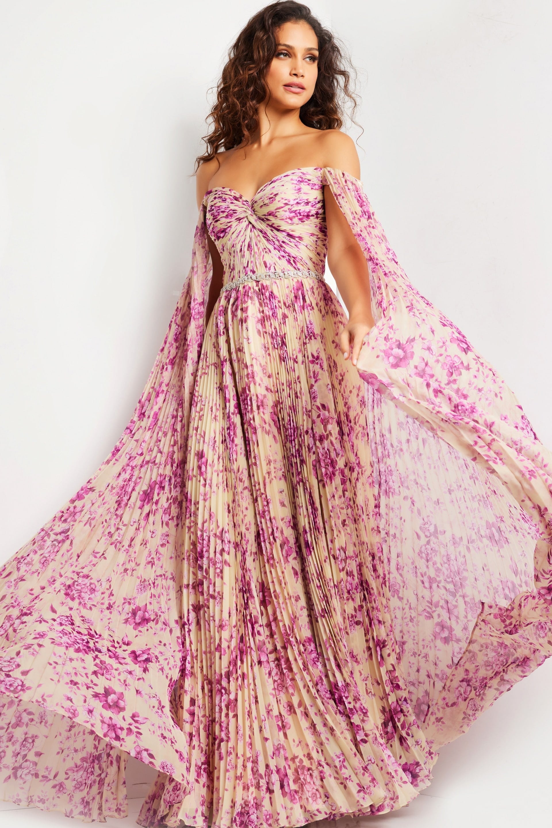 Model wearing Jovani 26141 in a printed pattern with flowing sleeves from the front view.
