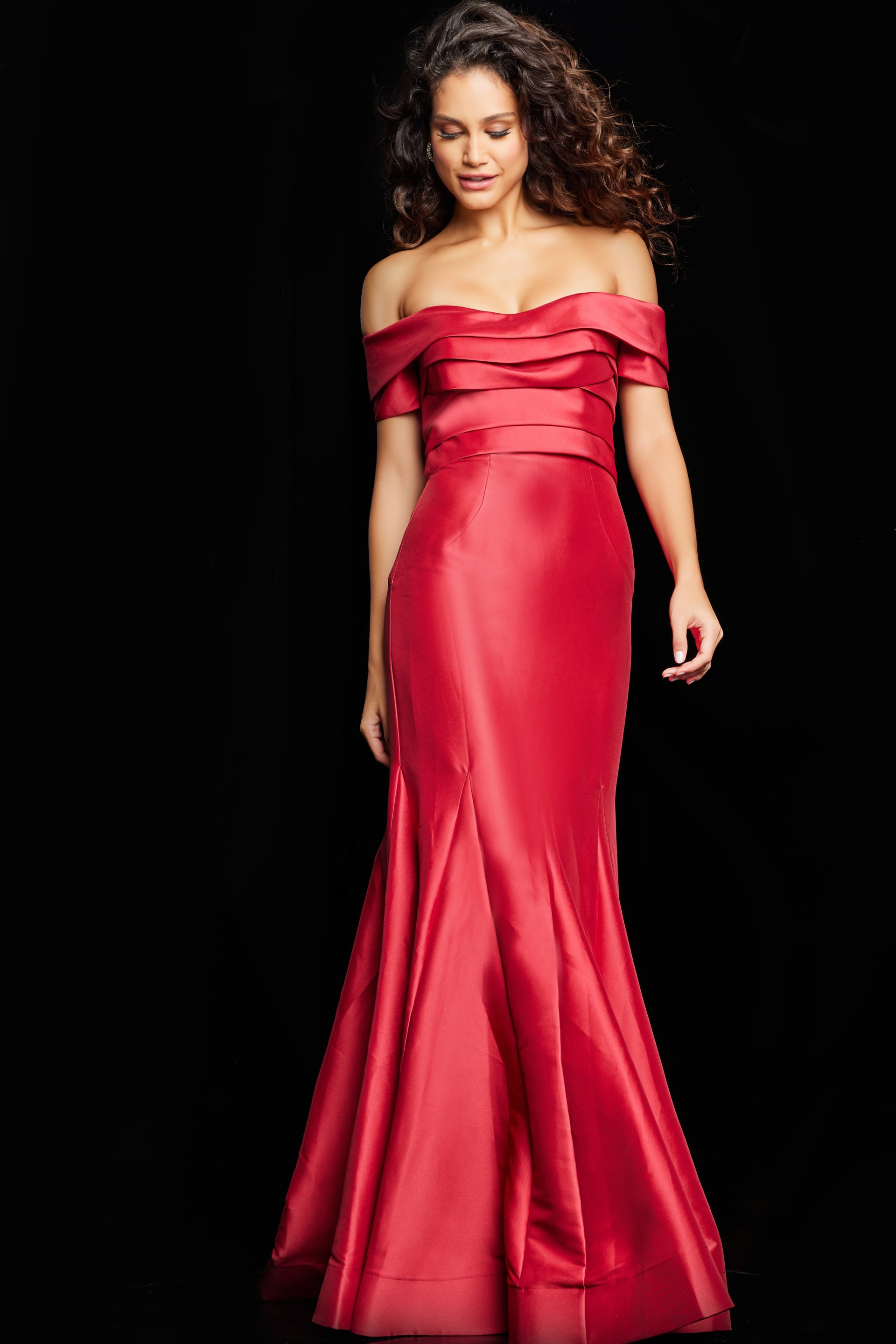 Model wearing Jovani 26187 red off-the-shoulder gown front view