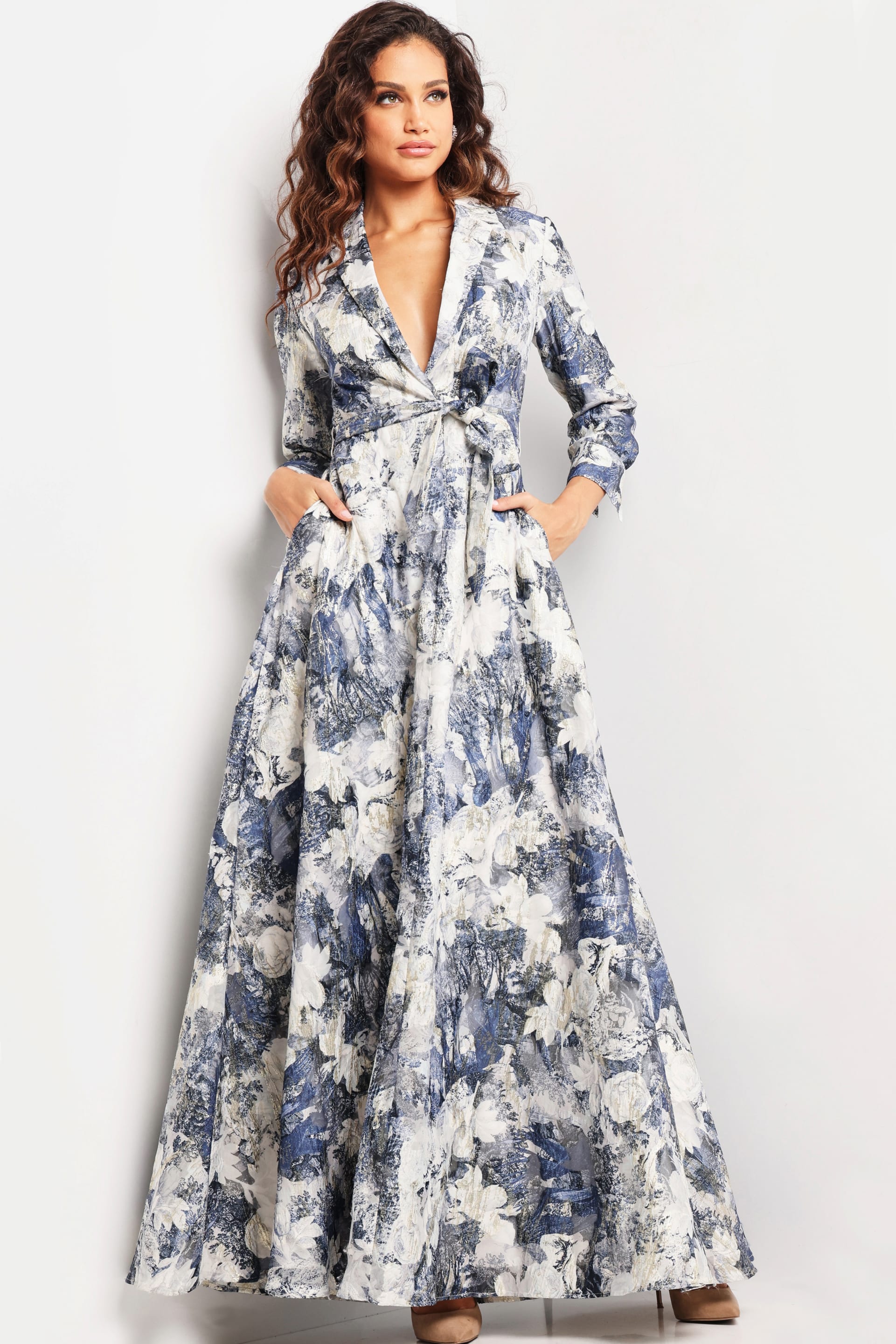 model showcasing Jovani 26202 dress with elegant print and tie waist detail