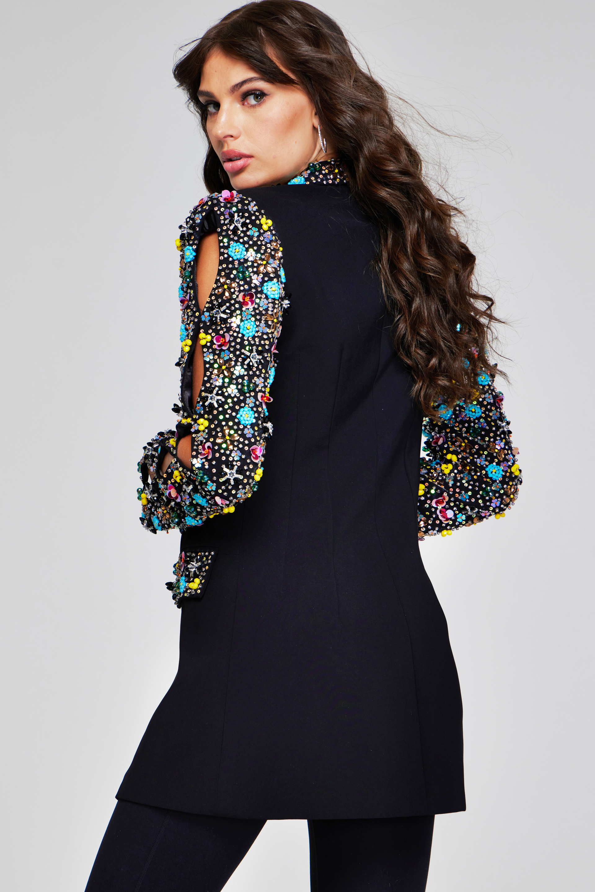 model wearing Jovani 26304 black dress, back view