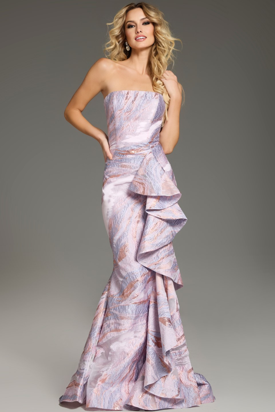 Model showcasing Jovani 31137 pink mermaid gown with side ruffles