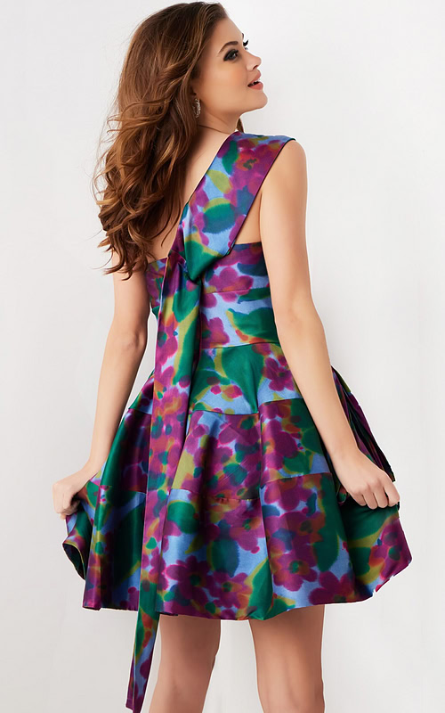 Back view of Jovani 34408 showing the bow accent on a vibrant floral pattern.