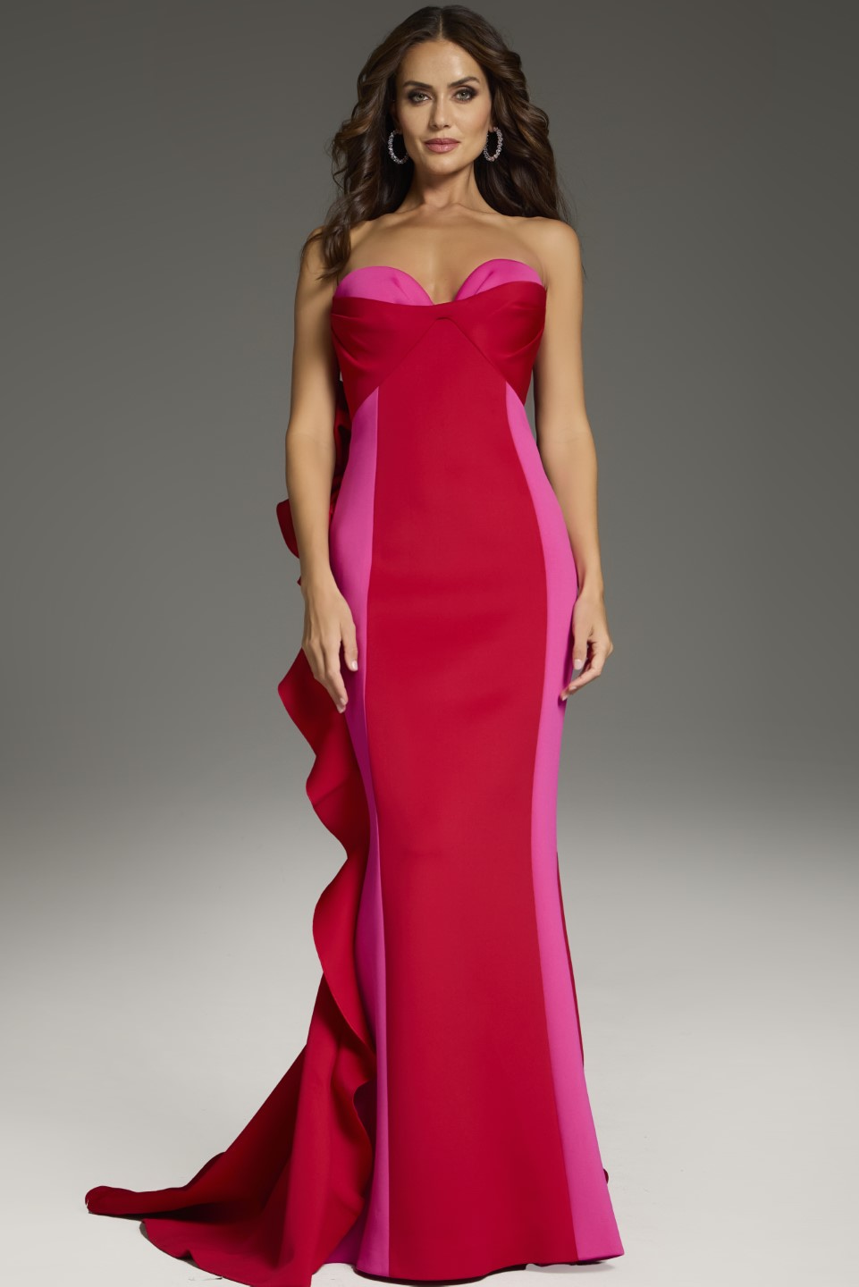 Model wearing Jovani 36372 red floor-length gown with sweetheart neckline.
