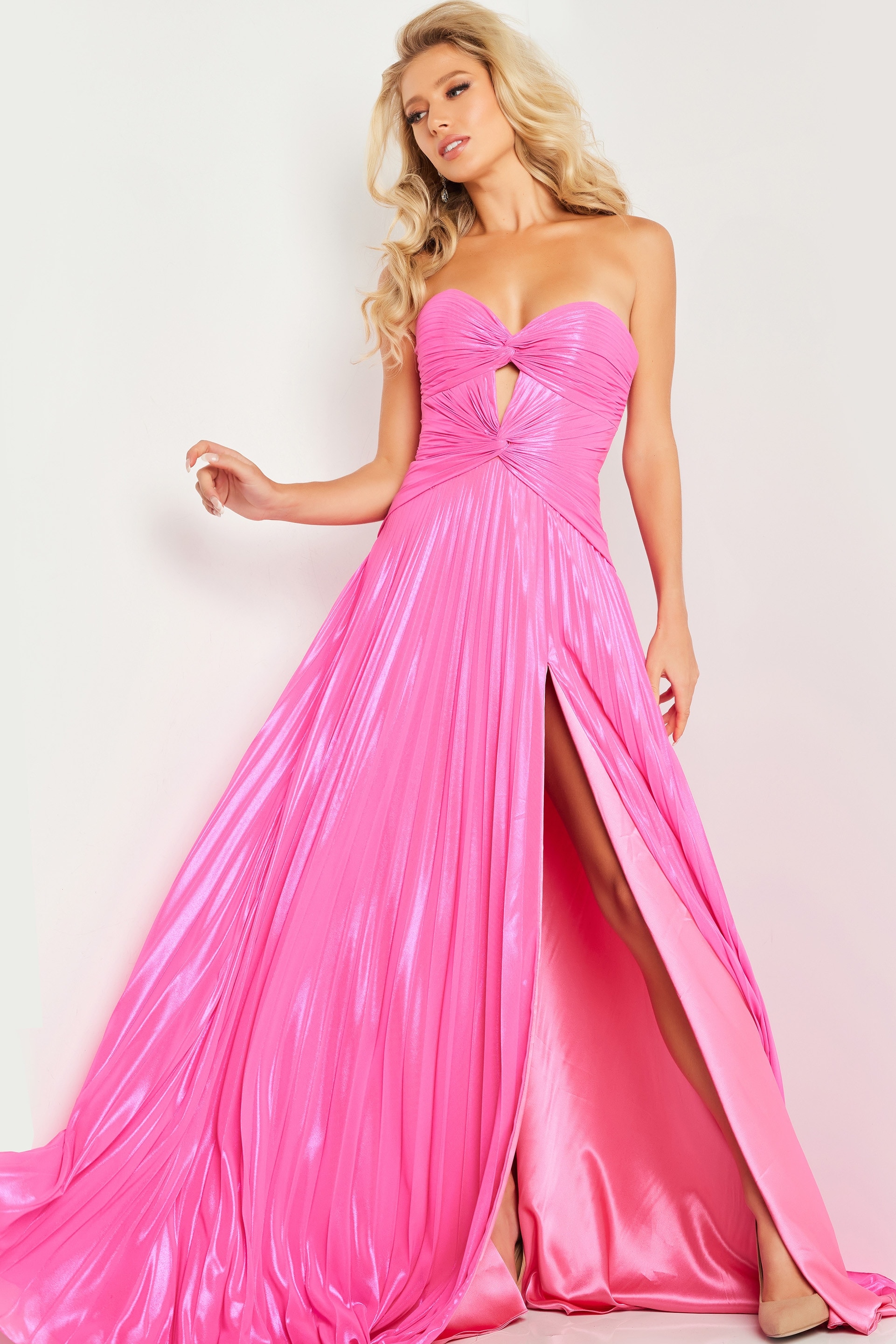 Model wearing Jovani 36461 pink dress with sweetheart neckline and high slit
